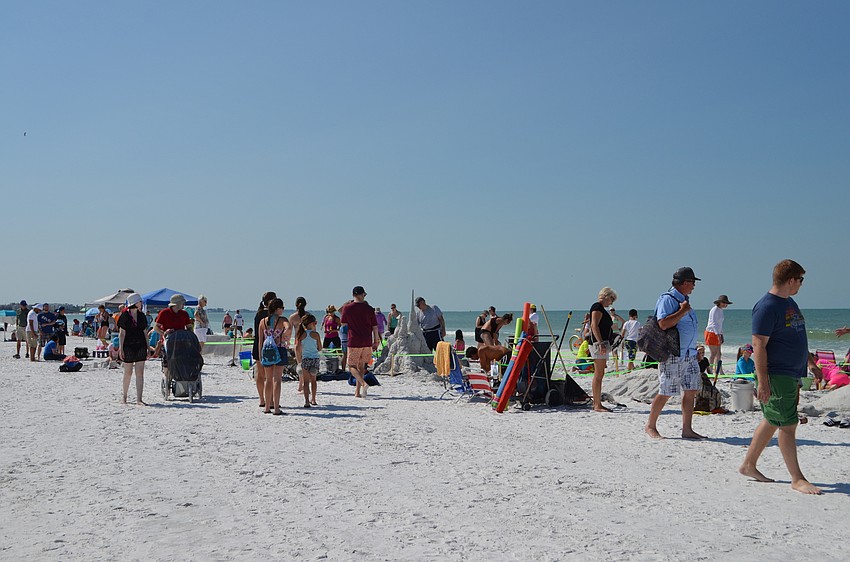 Beachgoers took in the 44th annual Sand Sculpture Contest on Siesta Key Saturday morning.