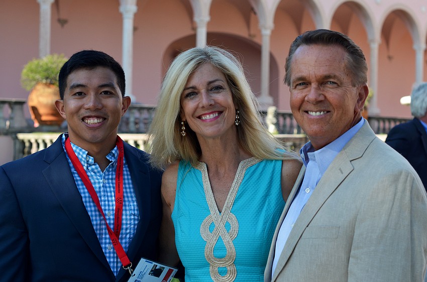 Darrell Xayarath with Merrill and Bill Henry