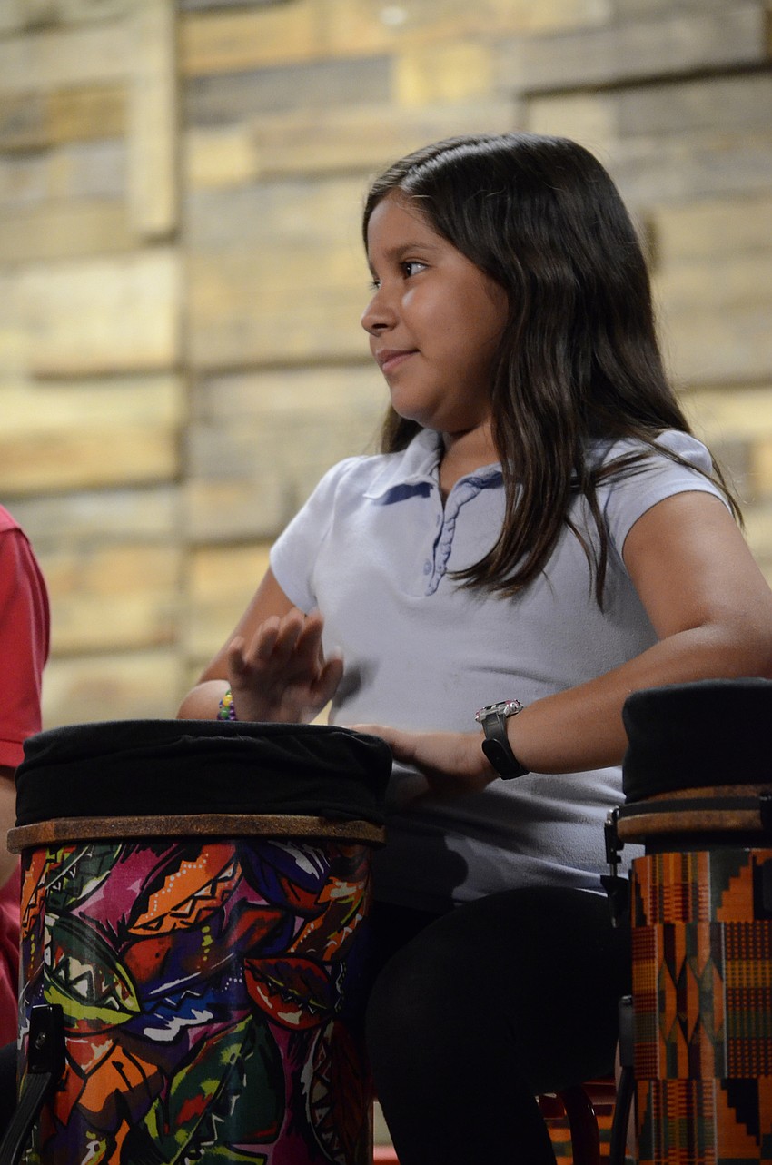 Melanie Lopez plays the drums.