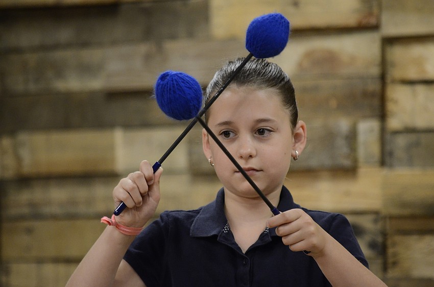 Isabella Bills plays the contrabass bar.