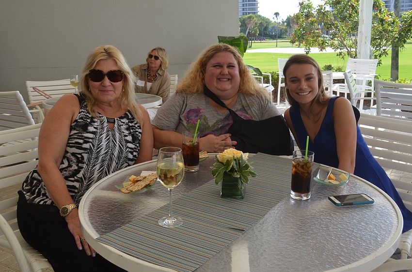 Cheri and Melissa Dweck with Kelsey Fisher, of Sarasota High School