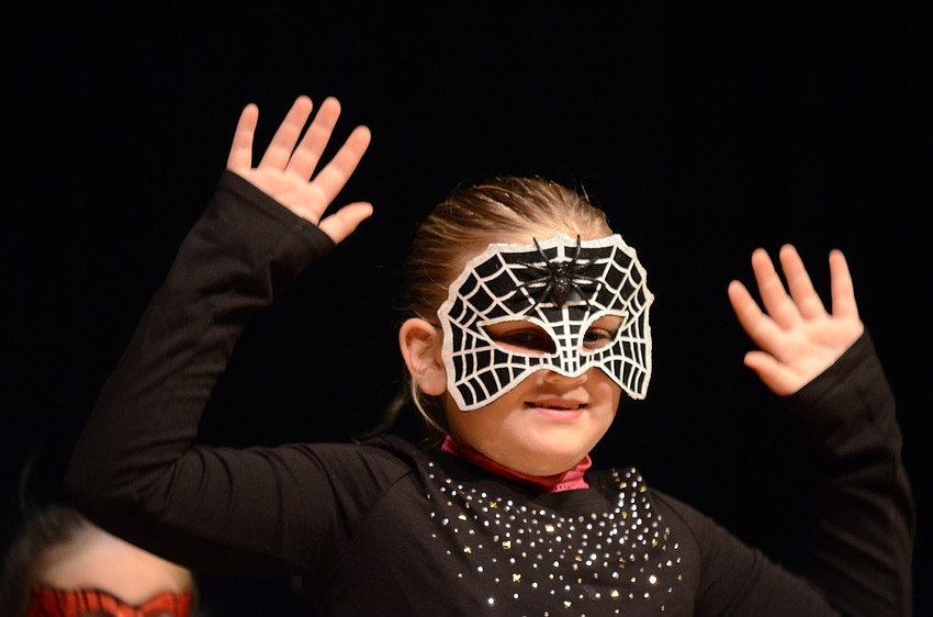 Tara first-grader  Ella Rodgers dances to Itsy Bitsy Spider.
