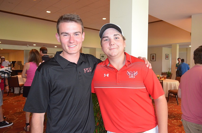 Ryder Bilter and Robby Tingler, who helped caddy the private round of golf for sponsors