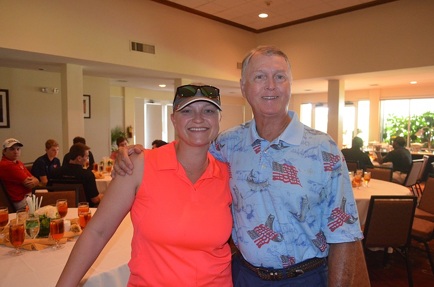 Leah Brown, of Bright House Network, with dad, Mike Knowles, retired Manatee High School golf coach