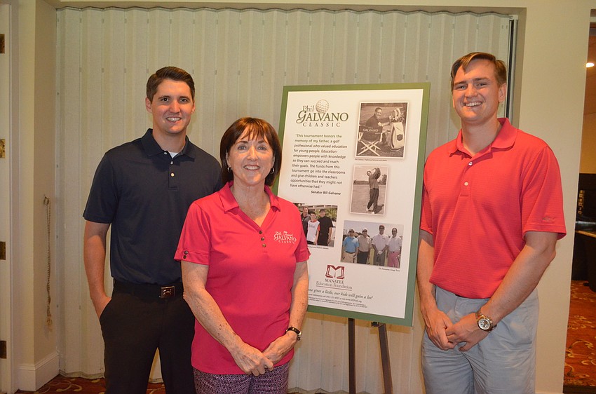 Matthew Yost, Mary Glass, executive director of the Manatee Education Foundation, and Brody Enwright