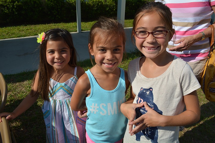 Emery, Avery and Isla Stewart came out with their grandma, Nancy Stewart.