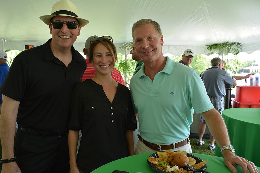 Bill Galvano poses with Katie Webb and Dean Cannon, former Speaker of the House.