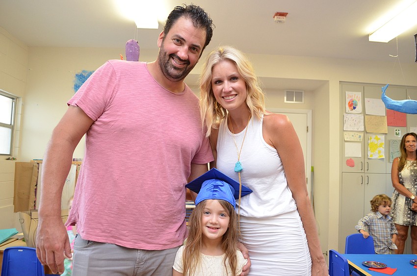 Proud parents Nick and Sara Ferguson with their graduate Elle.
