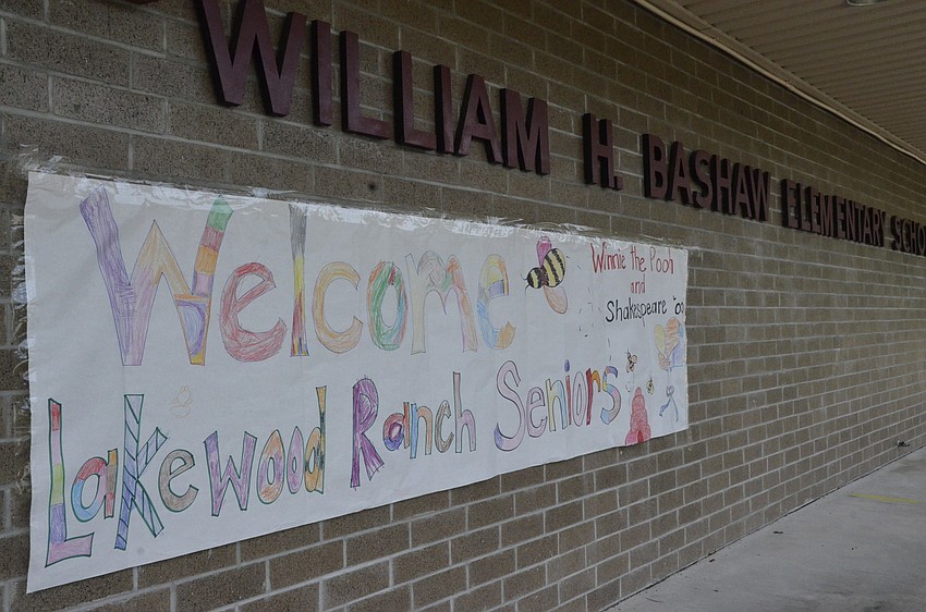 Bashaw students made a banner for Lakewood Ranch High School students. When word went over the intercom that the seniors had arrived, kindergarteners in Linda Schneider's class excitedly jumped up, saying 