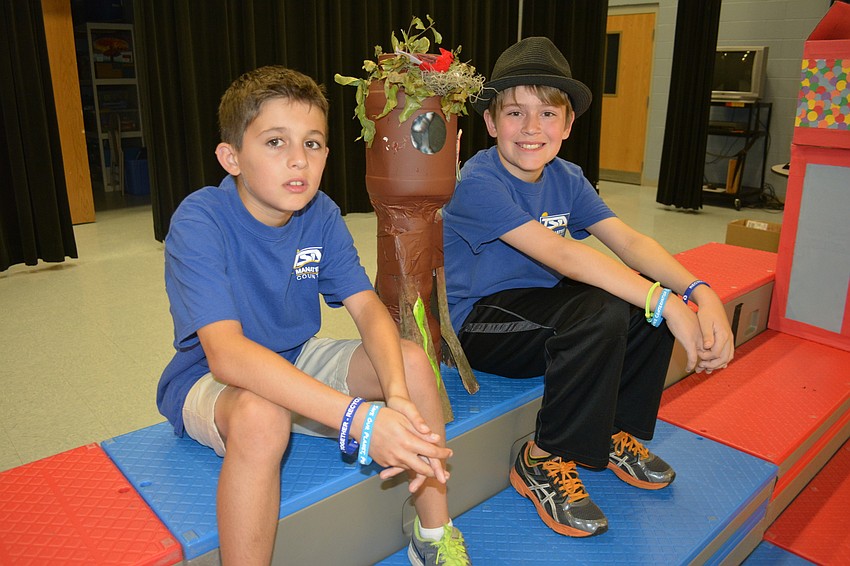 Donovan Cinelli and Kage Jones, Bashaw fifth graders, used an Animal Crackers container to build their water tower.