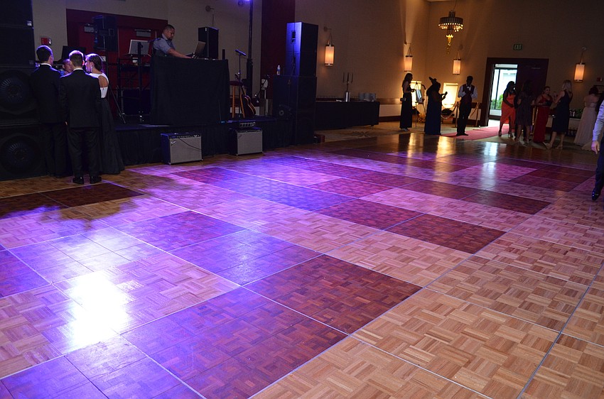The dance floor at the Hyatt Regency Sarasota had the initials for Sarasota High School spelled out.