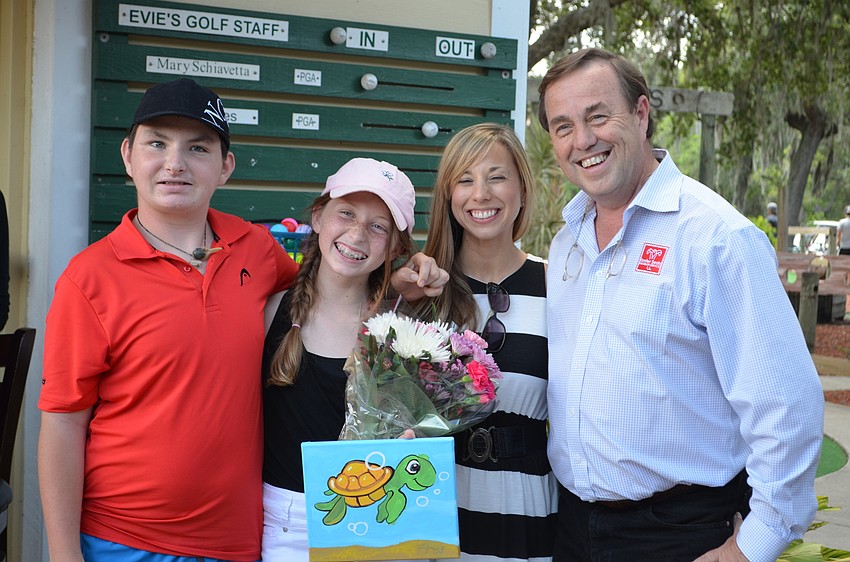 Dylan Mayes, Turtle Inc. founder Lexi Mariash, Mote Marine Laboratory Chief Development Officer Erin Knievel and Easter Seals Southwest Florida President and CEO Tom Waters.