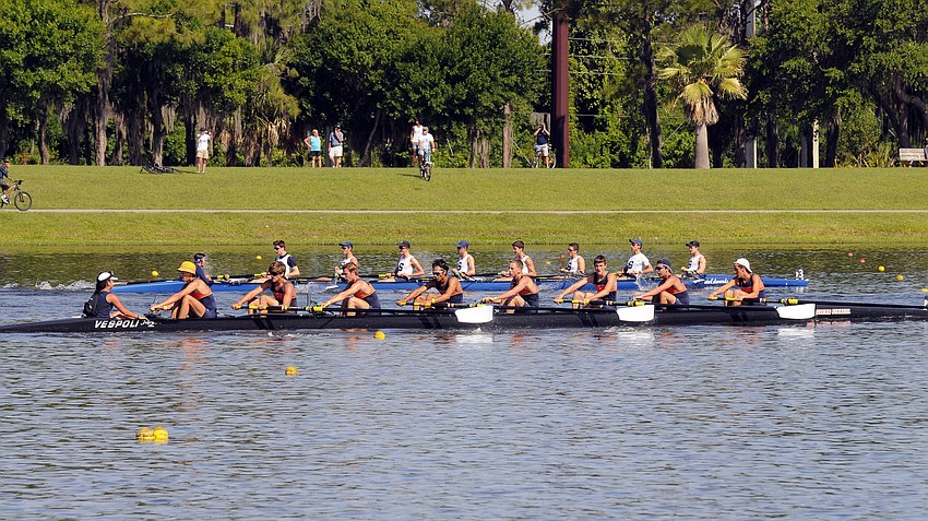 OARS and the Sarasota Crew battle for second place in the Men's Youth Lightweight 8+.