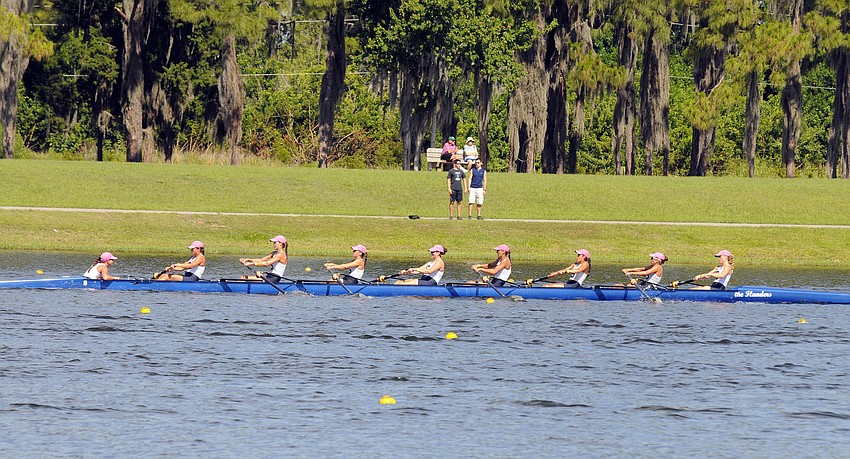 The Sarasota Crew Women's Lightweight 8+ crossed the finish line in 7 minutes, 22.850 seconds.