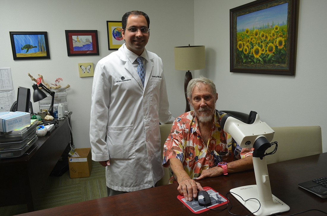 Dr. Joshua Mali, Dr. Joshua Mali, retina specialist at the Eye Associates in Sarasota, with patient, David Peirick