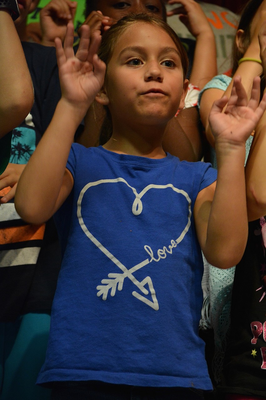 Kayla Reynolds sings how water trickles.