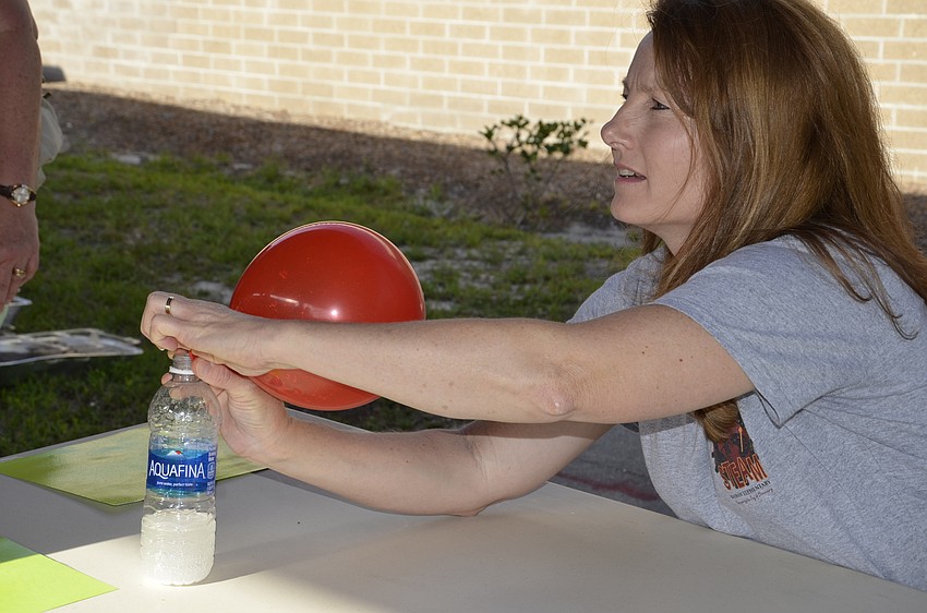 Margaret Gaitens shows how gas is made.