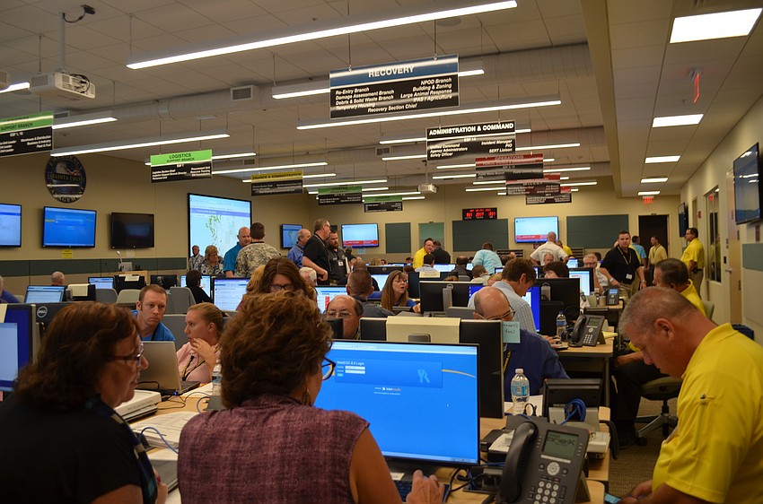 Sarasota County and municipality staff man their stations.