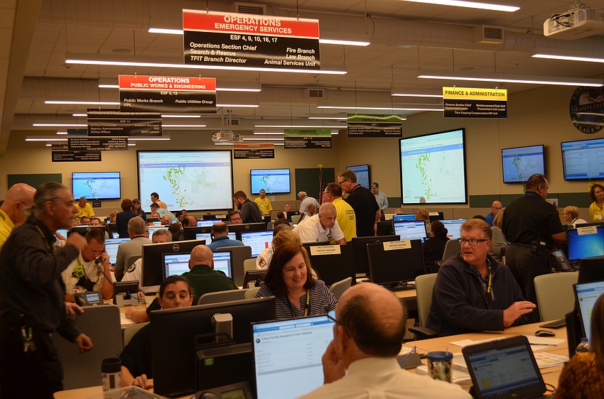 County directors all pitched in during a hurricane drill today.