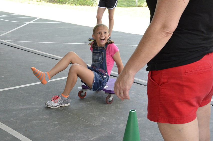 Aryanna Spainhower lost a shoe during the race, but persevered.