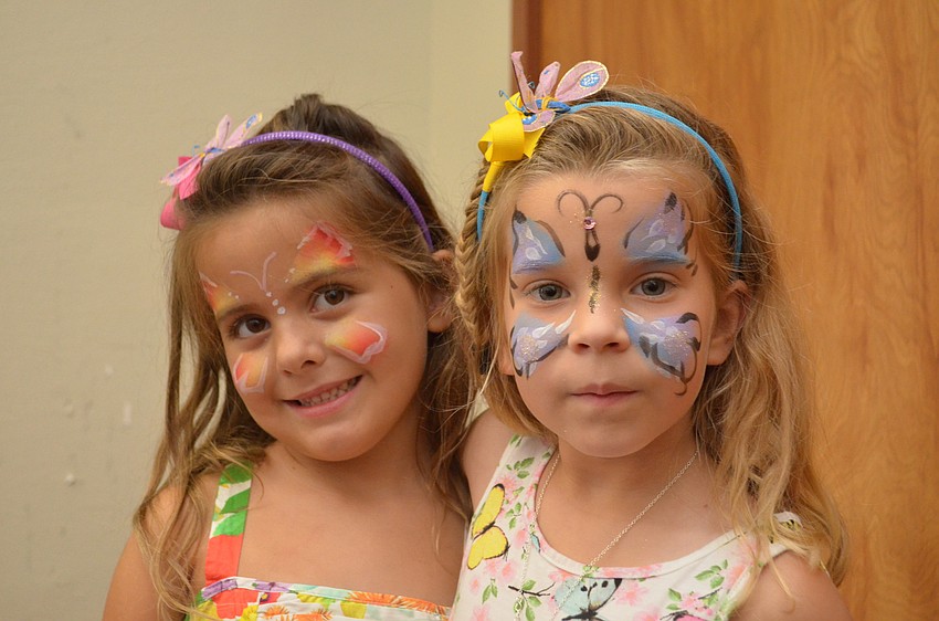 Classmates Charlotte Chapdelain and Harper Hollingsworth had their faces painted with butterflies.
