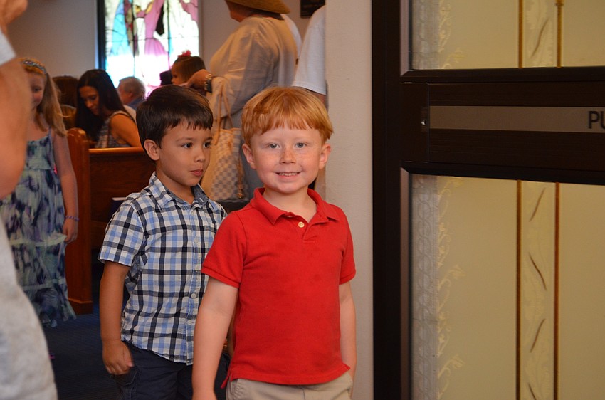 Jonathon Keisacker beams with excitement following the graduation ceremony.