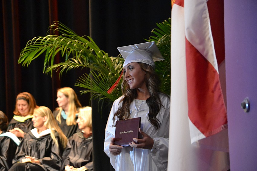 Emily Bellenghi poses with her diploma.