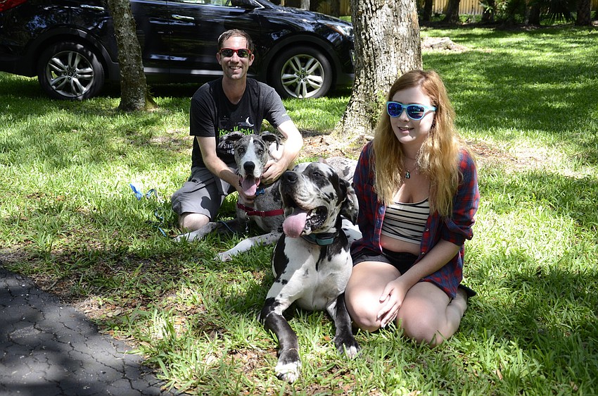 Kevin Viravec of Tampa with Sully and Mikayla Nolen of Bradenton with Zeke
