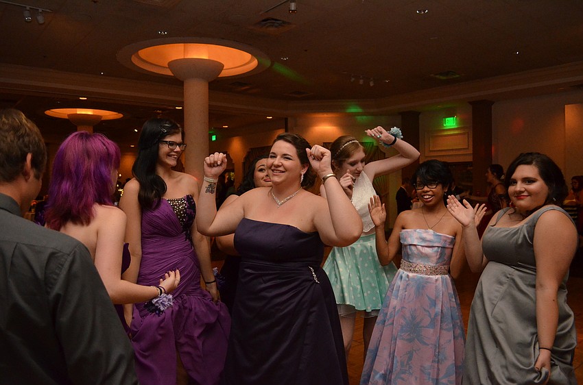 Students get down on the dance floor for the Booker High School prom.