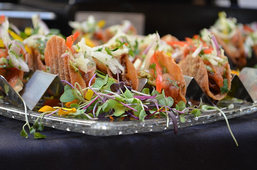 Chef Jamil Pineda, of Michael's On East, served wonton duck tacos with slaw and salsa.