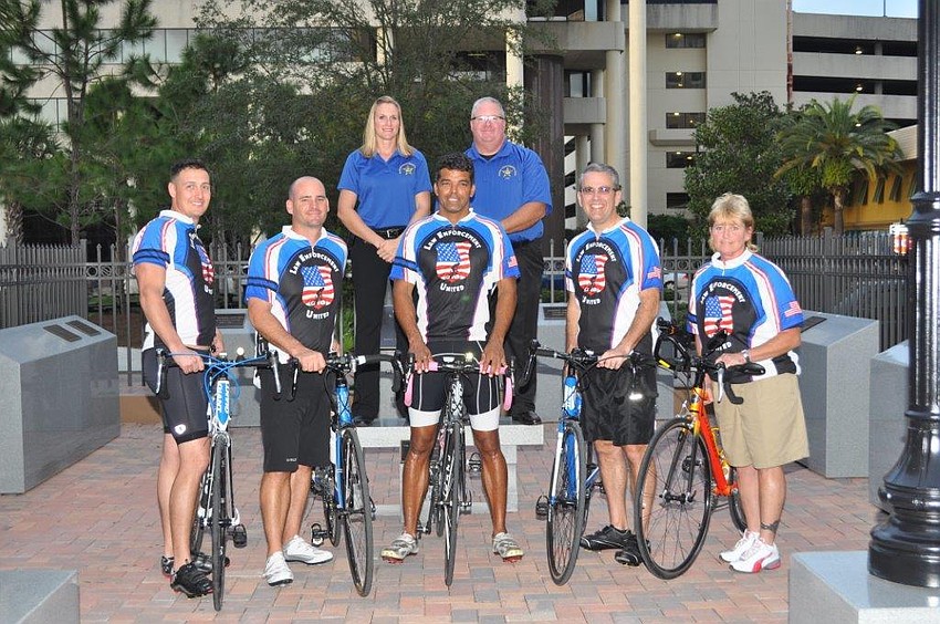 Back row:  Detective Patty Hetrick and Deputy Donnie Olmstead Front row: Sergeant  David Byington, Detective Jason Carey, Lieutenant Andy Ramdath, Major BJ Dixon and Deputy Sandy Keller. Photo courtesy BJ Dixon.
