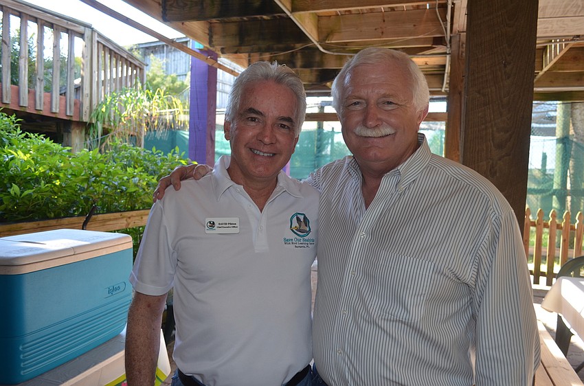 Save Our Seabirds CEO David Pilston and Jim Shirley, executive director of the Arts and Cultural Alliance of Sarasota County