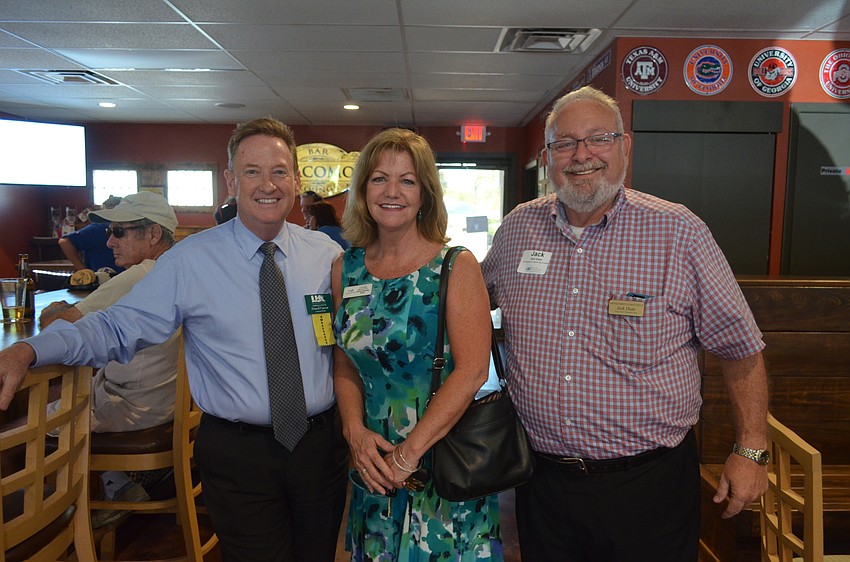 David Farrar, of Centennial Bank, Laurie Francey, of Jennette Properties, and Jack Dean, of Montgomery’s Carpets