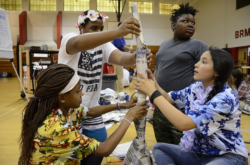 Damarion Murray, Frankie Robinson, Tyanna Smith and Veronica Hernandez built a 49-inch tower and balanced a tennis ball on top.