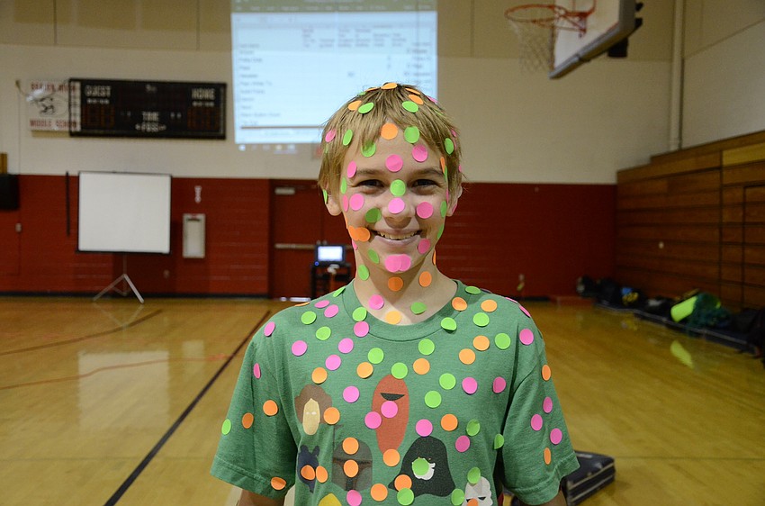 Noah Broneill sports spots to represent his team.