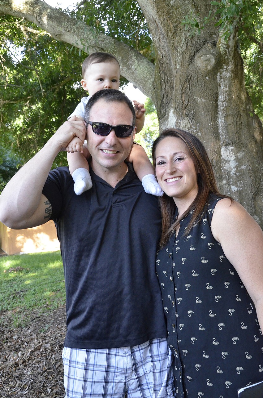 Asher Resnick gets a ride from dad Mark and Shayna Resnick.