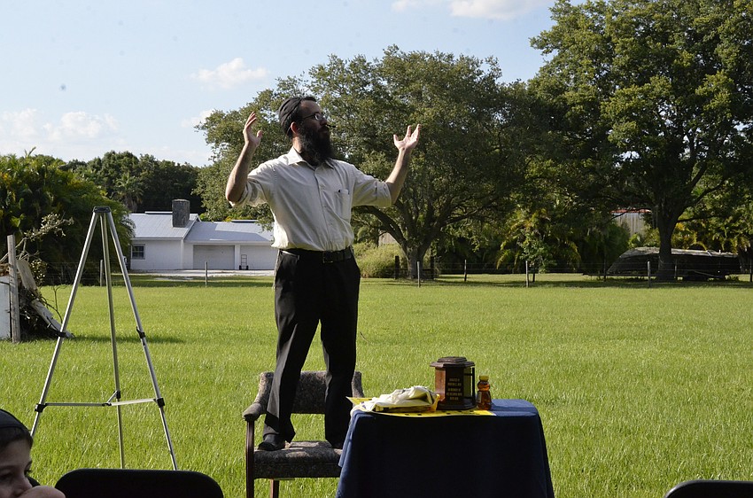 Rabbi Mendy Bukiet starts the festivities.