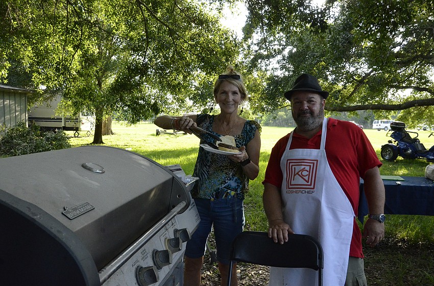 Ricki Rubin and Steven Weinshel cook up dinner for Lag Ba'Omer guests.