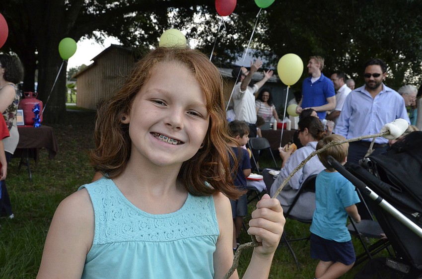 Mia Knefelkamp gets ready for roasting a marshmallow.