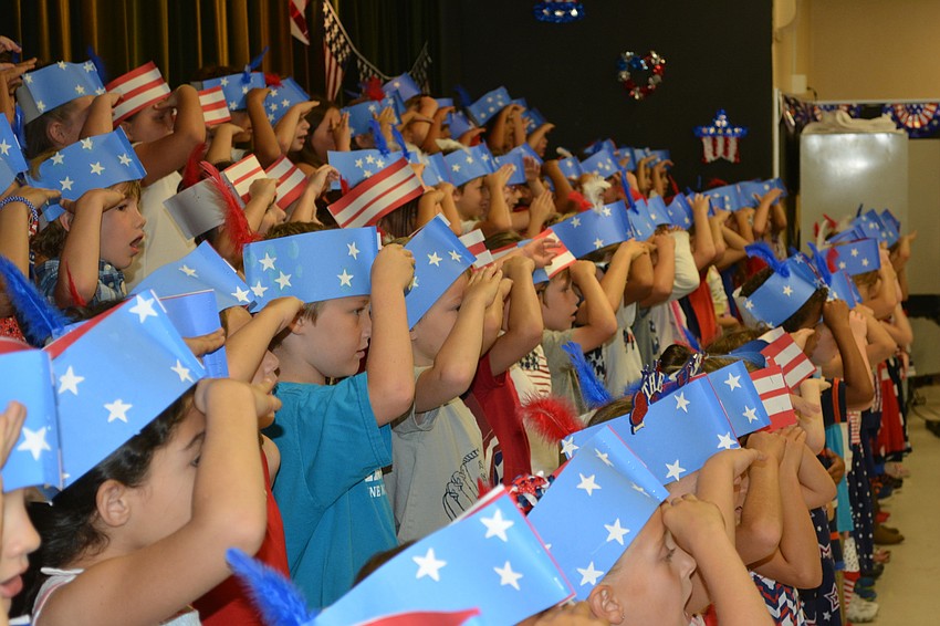 Witt first-graders offer a salute.