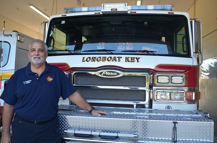 Lt. Keith Tanner signed the new firefighter contract.
