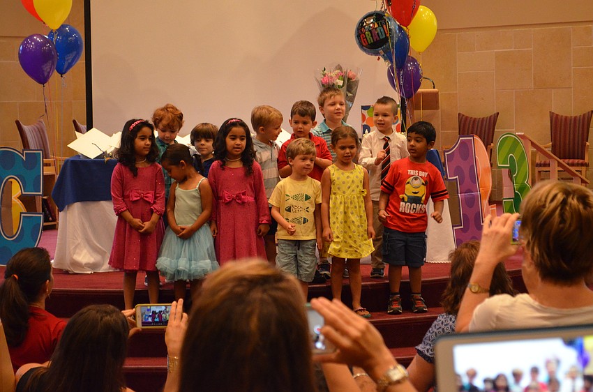 Students perform for parents during The Gan preschool graduation ceremony.