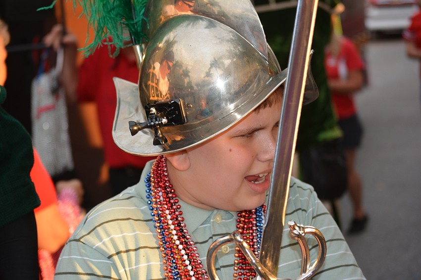 Alexander Browne, 10, enjoyed the opportunity to wear a helmet and hold a sword as the Crewe of De Soto passed.