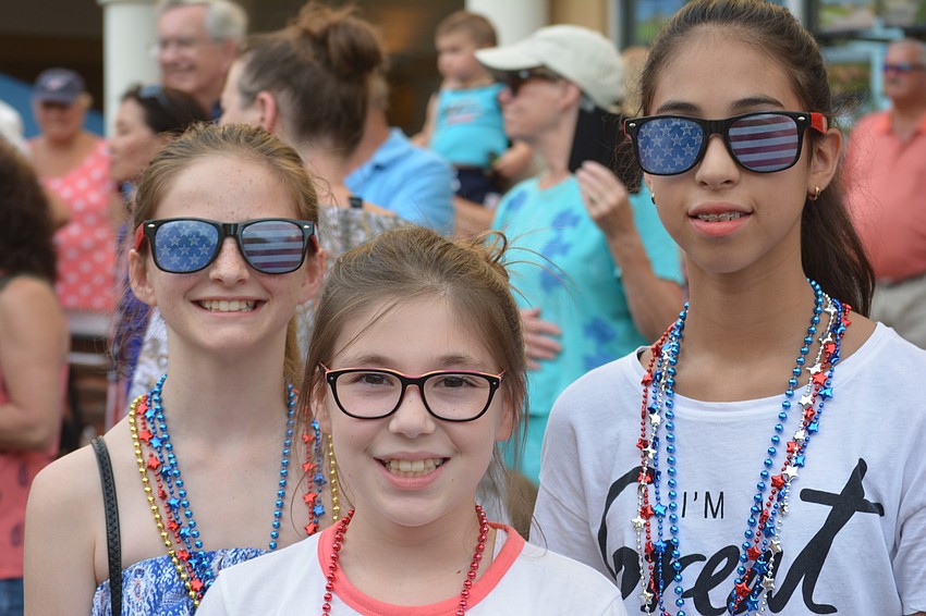 Lexi Kahler, 11, Olivia Sherry, 11, and Maya Rengifo 12, had a blast at the parade.