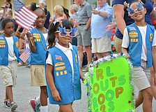 Girl Scouts Troop 523 shows up at the Tribute to Heroes Parade sporting some stylish sunglasses.