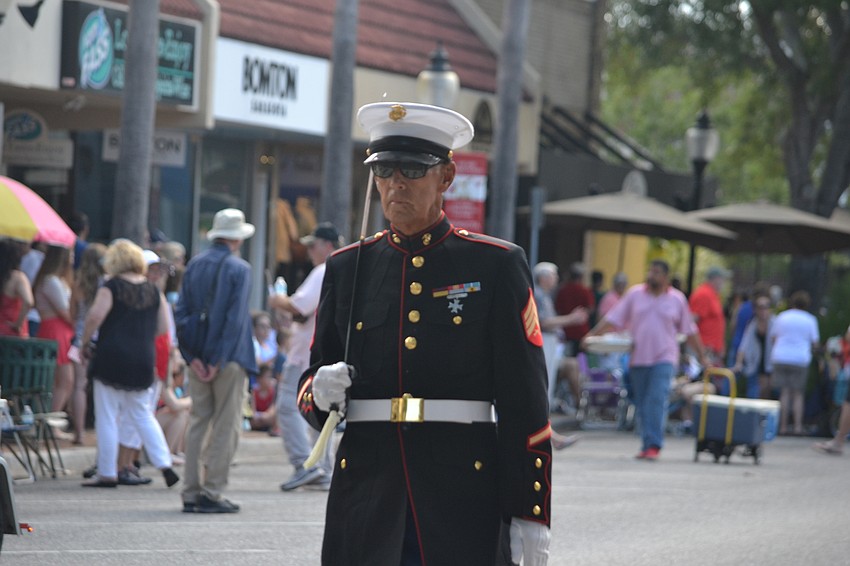 Jim Grams marches alone in the Downtown Sarasota Memorial Day Parade.