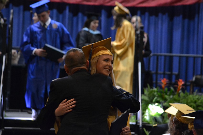 Parker Smith receives a farewell hug.