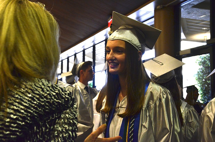 Melissa Ackaway talks to her calculus teacher Ann Johnson.