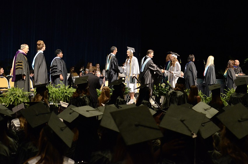 Lakewood Ranch's 470 seniors receive their diplomas, amid cheering from their friends and family.