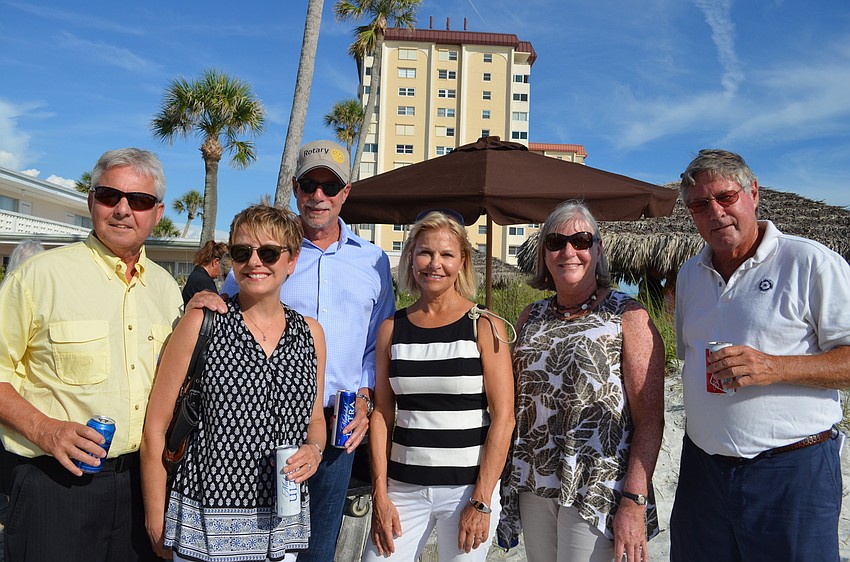 Bob Erker, Liz and Jay Sparr, Jan Gaudreau, Carol Erkey, Longboat Key Rotary Club president and Andy Sawyer